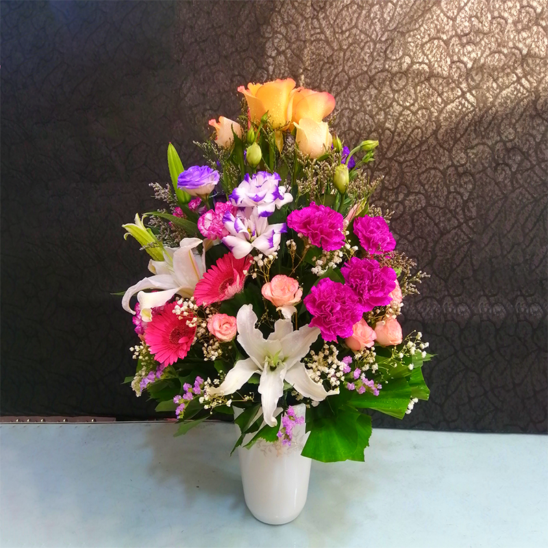 Bouquet of Roses, Lily, Carnation in Ceramic Vase